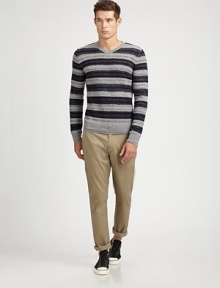 A modernized version of the favorite striped sweater, crafted with a fine-gauge softness by the label defining contemporary knitwear. V-neck84% merino wool/8% baby camel/8% nylonDry cleanImported
