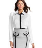 A new take on black-and-white style! Eye-catching accents create perfect design on this inspired top from XOXO.