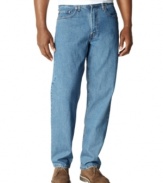 Take it easy in this relaxed-fit jean from Levi's. Versatile medium stonewashed finish in 13 oz. denim with light wear along pockets and hem. Five-pocket styling with signature stitching on back pockets. Zip fly.