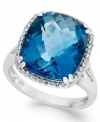 A solo standout, this chunky cocktail ring features a vibrant, cushion-cut London blue topaz (9-3/8 ct. t.w.) edged by round-cut diamonds (1/5 ct. t.w.). Set in 14k white gold.