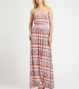 For a casual-cool spring look that is sure to turn heads, this floor-sweeping maxi dress in a bold, vibrant print is the perfect choice. StraplessBuilt-in bra for added supportBanded elastic waistAllover graphic printAbout 62 from natural waist92% modal/8% spandexDry cleanMade in USAModel shown is 5'9 (176cm) wearing US size Small.