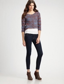 A chunky marled knit, finished with a shirttail hem and raglan sleeves.Boatneck Three-quarter sleeves Ribbed trim Pullover style About 22 from shoulder to hem 65% alpaca/35% acrylic Dry clean Imported A chunky marled knit, finished with a shirttail hem and raglan sleeves.Boatneck Three-quarter sleeves Ribbed trim Pullover style About 22 from shoulder to hem 65% alpaca/35% acrylic Dry clean Imported