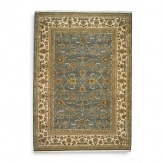 Modeled after the world's most prized antique textiles, this luxuriant Karastan rug lends opulence and heirloom beauty to your home. Surrounded by a light border to add depth and contrast, the stylized pattern depicts lush flora and curvilinear accents. First introduced in 1928, the Original Karastan Collection established the highest standard for traditional Oriental machine woven rugs.