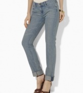 Distinguished by a sleek silhouette with a skinny leg, Lauren Jeans Co.'s essential jean in soft, washed denim is finished with allover fading and a chic cuffed hem.