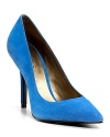 These GUESS pumps are electric with dynamic pointy toes in vibrant blue suede--a thrilling addition to workday or weekend ensembles.