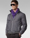 The Simpluxe jacket is crafted from lightly filled featherweight nylon taffeta with a stowable hood and soft jersey lining to combine superior protection from the elements and uncompromised mobility.
