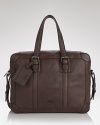 An uncommonly smart everyday bag, this BOSS Black briefcase is crafted from fine supple leather, outfitted with excellent organizational pockets and designed for handsome, masculine appeal.
