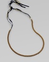 A fine herringbone chain with a gilded grosgrain ribbon tie.Brass Grosgrain ribbon Adjustable ties About 25½ long Imported