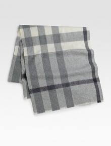 An elegant winter essential in a tonal plaid pattern with unfinished edges.Raw edges78 X 14WoolDry cleanMade in Great Britain