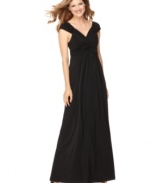 A sweeping maxi dress never fails to make a major fashion statement, no matter what the event! NY Collection's petite version features a flattering empire-waist silhouette and chic cap sleeves!