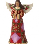 A celebration of fanciful colors and eye-catching shapes, this praying angel adds a charming touch and a folk-inspired accent to your space.