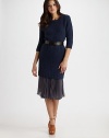 Crisp accordion pleats shape this kicky mid-length silhouette.Thin waistbandSide zipperAbout 27 longPolyesterDry cleanImported