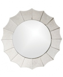 A bright spot in any home, Howard Elliot's Rupal wall mirror features a scalloped frame with antiqued and mirrored accents. A bright spot in any home, Howard Elliot's Rupal wall mirror features a scalloped frame with antiqued and mirrored accents.