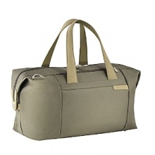 An ideal bag for a weekend car trip. This large travel satchel is roomy, providing the ultimate packing space. It even expands to give you more room if needed. Made of durable ballistic nylon, this bag will withstand tough travel conditions with ease. Roomy main compartment with multiple organization pockets Snap down, top corners shape bag and offer added packing space when unsnapped. Dual purpose slip-through back pocket allows bag to slide over Outsider® handle for easy transport An ideal bag for a weekend car trip. This large travel satchel is roomy, providing the ultimate packing space. It even expands to give you more room if needed. Made of durable ballistic nylon, this bag will withstand tough travel conditions with ease. Roomy main compartment with multiple organization pockets Snap down, top corners shape bag and offer added packing space when unsnapped. Dual purpose slip-through back pocket allows bag to slide over Outsider® handle for easy transport