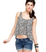 A grid of cutouts at the back lends skin-baring punch to this printed top from Material Girl! For great style that's black and white, rock the top with any pair of this season's super feisty cut-offs!