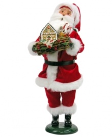 Santa Claus can't help but carol as he presents Mrs. Claus with a handcrafted gingerbread house from Byers' Choice. Dressed in his holiday best – red velvet, of course! – he's the picture of holiday cheer. Santa Claus can't help but carol as he presents Mrs. Claus with a handcrafted gingerbread house from Byers' Choice. Dressed in his holiday best – red velvet, of course! – he's the picture of holiday cheer.
