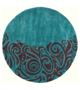 Color splash! Inspired by 1950s abstract expressionism, this Momeni area rug combines vibrant designs with the supremely soft texture of hand-tufted, hand-carved Chinese wool. In two striking tones of turquoise and maroon, this fashion-foward piece imparts a chic, contemporary feel in any space.