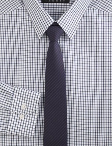 A modern, finely tailored addition to the 9-to-5 wardrobe with new-look check pattern. Buttonfront Point collar 98% cotton/2% elastane Dry clean Imported 