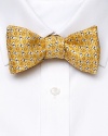 A classic touch to your dressed-up look, this handsome dog-print tie is crafted in quality Italian silk.