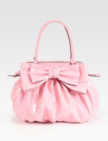 Lustrous patent leather in a roomy carryall, topped with a chic oversized bow.Double top handles, 7 dropTop zip closureOne inside zip pocketTwo inside open pocketsCotton lining14W X 13½H X 4DMade in Italy