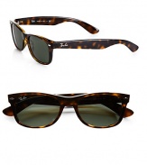 Funky two-tone frames update this modern wayfarer style. Available in black with green lens or havana with brown lens. Plastic Made in Italy 
