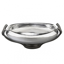 Crafted from stunning metal alloy, this lovely bowl is destined to become a go-to piece. Its pod-shaped vessel artfully frames whatever you put in it with its gently curling lip and a dose of glossy shine, and then tapers to a graceful pedestal base.