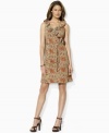 Lauren Jeans Co.'s chic sleeveless jersey dress is accented with feminine ruffles and slim ties at the waist for a flattering silhouette.