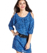 Fully loaded with cool details, from the animal-print to the shoulder cutouts, this party dress from Sugar & Spice defines daring style.
