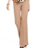 Crepe fabric creates a fluid drape on Nine West's office-ready trousers. A wider, trouser-cut leg creates the illusion of smaller hips and waist.