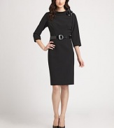 This tailored crepe design is dressed up with a patent belt and a matching flower at the neck.Roll neck with patent flower appliquéThree-quarter sleevesWaist dartsPatent beltBack ventConcealed back zipFully linedAbout 23 from natural waist88% polyester/12% polyurethaneDry cleanImportedModel shown is 5'9 (175cm) wearing US size 4. 