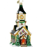 With doors wide open, this traditional hand-painted church ornament is utterly welcoming, featuring festive hues, gold glitter and a pair of decorated Christmas trees. From Christopher Radko.