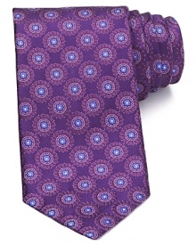 Canali invokes Eastern influence with a pattern of circular mandalas for an artful addition to your fine collection of ties.