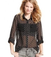 A burst of polka-dots brings fun style to the sheer button-down blouse! From Tommy Girl.