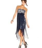 Abundant in razzle-dazzle style, this strapless dress from City Studios wows with its silver sequins and overlay of soft, chiffon strips.