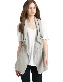 THE LOOKSleevelessDraped collarOpen frontRolled hemTHE FITAbout 28 from shoulder to hemTHE MATERIALCashmereCARE & ORIGINDry cleanImportedModel shown is 5'8½ (174cm) wearing US size Small. THE LOOKSleevelessDraped collarOpen frontRolled hemTHE FITAbout 28 from shoulder to hemTHE MATERIALCashmereCARE & ORIGINDry cleanImportedModel shown is 5'8½ (174cm) wearing US size Small.