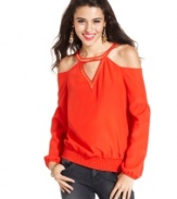 Elevate your casual look with this top from Rampage! A chic array of cutouts lend infinite style to this smocked design.