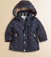 Keep him snug and dapper in this classic check-lined, quilted coat with removable hood and lots of pockets.Snap-off lined hoodStand collarLong sleevesSnap front and zip closureTwo zip-up slash pockets Fully linedNylonMachine washImported Please note: Number of snaps may vary depending on size ordered. 