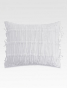 Make your bed especially inviting with this feather-filled, pure white pillow soften with shirring and side ties.16 X 20Feather fillingCottonMachine wash coverImported Make your bed especially inviting with this feather-filled, pure white pillow soften with shirring and side ties.16 X 20Feather fillingCottonMachine wash coverImported