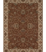 Evoking the strong look of ancient Sarouk rug designs, the Premier area rug from Dalyn is woven with intricate floral medallions in rich chocolate. Made in Egypt of durable polypropylene and shimmering polyester fibers, it provides any room with captivating texture and added dimension.