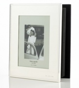 Polished to a lustrous mirror-like finish, this elegant bookshelf album cloaks your wedding memories in sheer, subdued splendor. With Mr. & Mrs. engraved in the bottom right corner of the cover and additional engravable 1 silver-plated inserts to add your own personalized touches. Holds 160 5 x 7 photos.