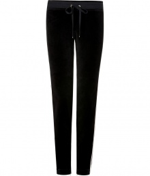 Work a modern edge into your laid-back look with Juicy Coutures jet black skinny velour pants - Drawstring elasticized waistline, tan grosgrain trim - Slim leg, figure-hugging fit - Team with oversized pullovers and chic fashion sneakers Work a modern edge into your laid-back look with Juicy Coutures jet black skinny velour pants - Drawstring elasticized waistline, tan grosgrain trim - Slim leg, figure-hugging fit - Team with oversized pullovers and chic fashion sneakers