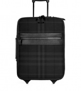 Travel in iconic style with Burberry Londons black check carry-on - Tonal leather trim, zip-around closure, zippered front pocket, retractable handle at back, reinforced base with wheels - The perfect size for carrying on-board, or for packing away chic weekend essentials