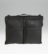 Tumi's original garment bag design, still sought after by business travelers. Universal hanger bracket for any hanger type Specially shaped pockets for shoes, accessories, belts and hair dryers Top carry handle and removable shoulder strap Add-a-bag sleeve lets it ride on wheeled cases Tumi Tracer Protection Ballistic nylon Imported 18H X 23½W X 5½D