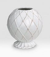 Bring the outdoors inside with a beautifully detailed, hand-finished stoneware vase detailed with lattice to celebrate the splendor and romance of the world's most beautiful gardens. Chip resistant 6H X 5½ diam. Dishwasher safe Imported