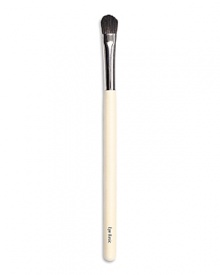A firm, flat and tapered medium size brush for fast, easy eye shade application. Made of luxuriously soft black squirrel hair. A firm, flat and tapered medium size brush for fast, easy eye shade application. Made of luxuriously soft black squirrel hair.