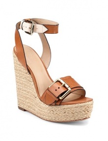 THE LOOKOpen toe Leather straps with contrast trim and goldtone buckles Adjustable ankle strapTHE FITRope-trim wedge heel, 6 (150mm) Rope-trim platform, 1¾ (45mm) Compares to a 4¼ heel (110mm)THE MATERIALLeather lining and sole Padded insoleORIGINImported THE LOOKOpen toe Leather straps with contrast trim and goldtone buckles Adjustable ankle strapTHE FITRope-trim wedge heel, 6 (150mm) Rope-trim platform, 1¾ (45mm) Compares to a 4¼ heel (110mm)THE MATERIALLeather lining and sole Padded insoleORIGINImported