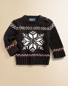An intarsia-knit snowflake design adorns this timeless crewneck sweater for heritage style.Ribbed crewneckLong sleeves with turn-back cuffsShoulder buttonsCottonMachine washImported Please note: Number of buttons may vary depending on size ordered. 