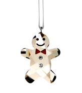 Simply adorable! This cute gingerbread man in Golden Shadow crystal is a real charmer with his Siam crystal bow tie, twinkling Jet eyes and friendly smile. Hanging on a white satin ribbon, this wonderfully nostalgic creation lends a sweet, festive touch to your Christmas tree or window.