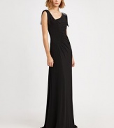 This glamorous ruched, beaded style evokes Old Hollywood romance.Asymmetrical necklineBeaded shoulder detailDrapes at neckline and shouldersRuched details on bodiceConcealed back zipFully linedAbout 45 from natural waist95% polyester/5% spandexDry cleanMade in USA of imported fabricOUR FIT MODEL RECOMMENDS ordering true size. 
