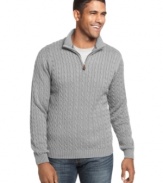 The heritage cable-knit design of this classic quarter-zip sweater from Izod lends instant polish to any casual combo. (Clearance)